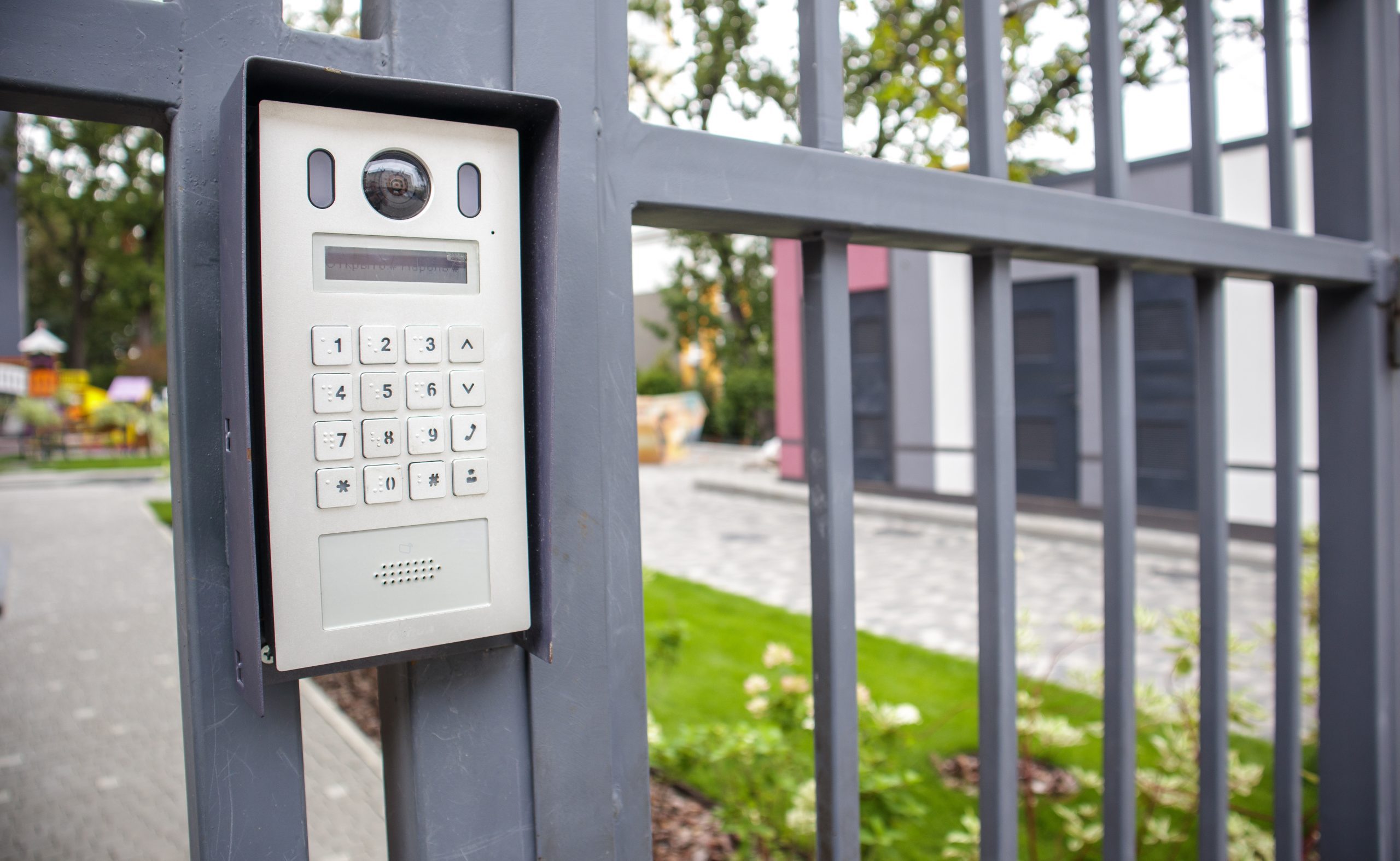 Video intercom on the gate at the entrance to the residential area. Electronic intercom to a private area. closed residential yard.